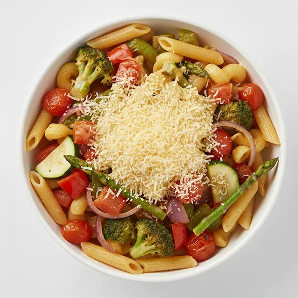 Roasted Seasonal Veggie Medley With Golden Cheese And Garlic Pasta